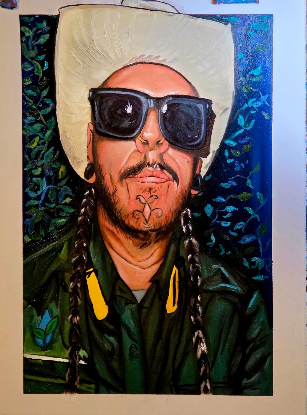Portrait of a man in a white hat and sunglasses